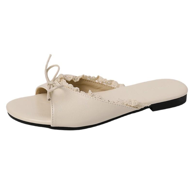 French bow delicate fairy style flat bottom one-word shoe women 2025 summer wear new non-slip cool slippers