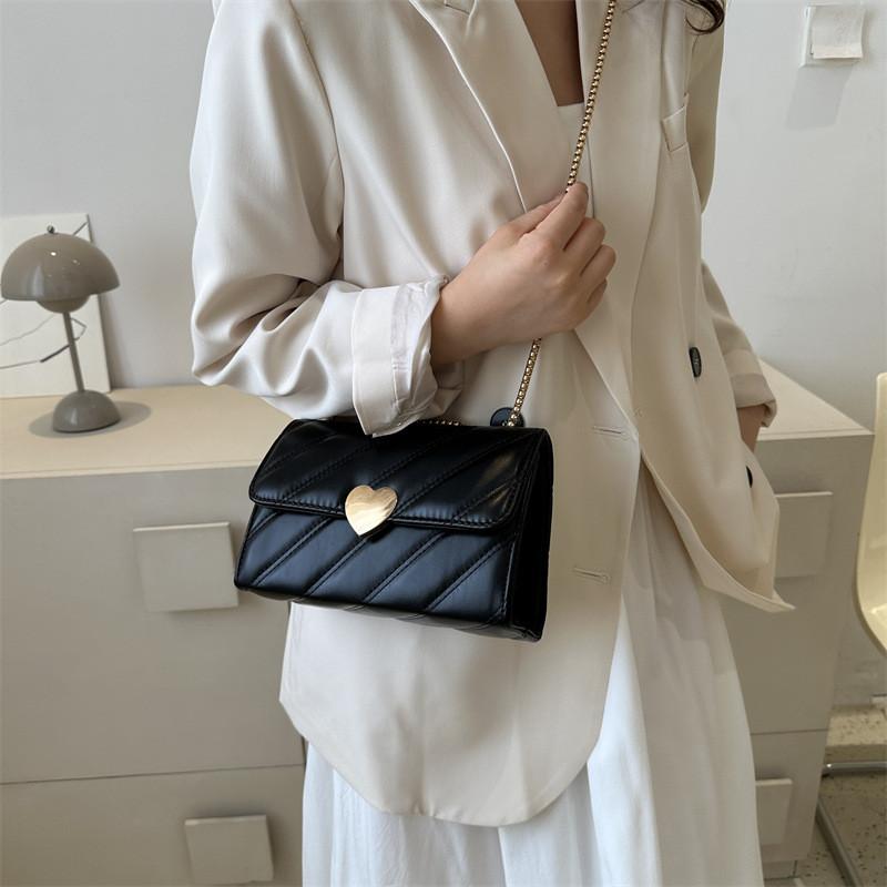 Stilvolle gesteppte PU-Handtasche für Damen in Schwarz, Khaki, Pink und Weiß. Perfekt für den lässigen Chic.