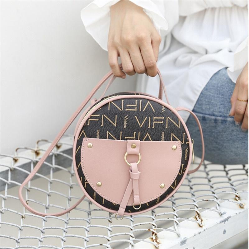 

Круглая женская сумочка cross body через плечо