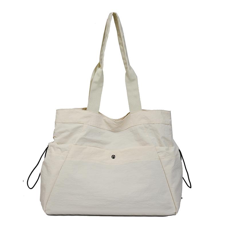 

Сумка-тоут большой вместимости женская водонепроницаемая дорожная сумка легкая сумка на плечо с завязками бежевый