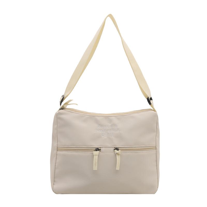 2025 spring new casual light cloth bag Japanese style solid color simple letter shoulder bag crossbody high value
