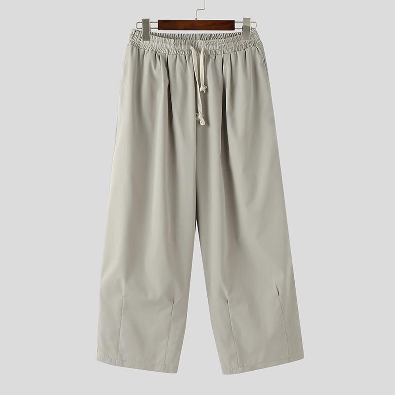 

INCERUN Мужские брюки на кулиске Повседневные эластичные на талии Длинные свободные брюки большого размера S