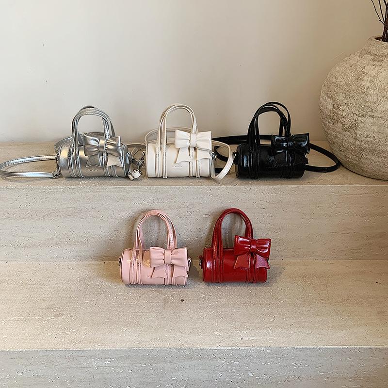 Simple and compact handbag bag women's 2026 summer new Korean bow crossbody Boston bag