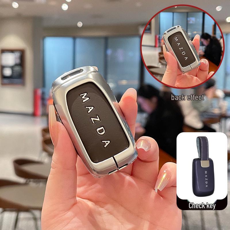 Kuooo: Wear-resistant, fully enclosed Mazda EZ6 key fob and EZ60 car remote protective cases with buckle.