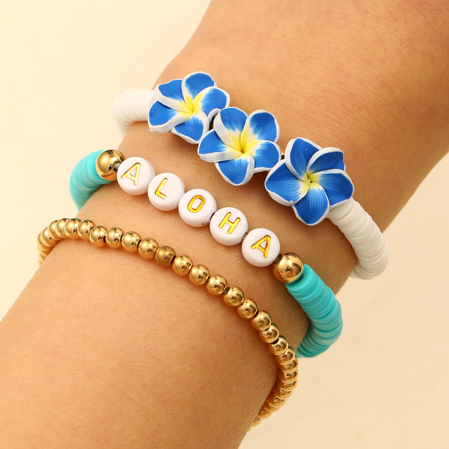 

2025 College Style Color Soft Pottery Ocean Element Bracelet Set Five-petaled Flower Starfish Round Bead Elastic Bracelet