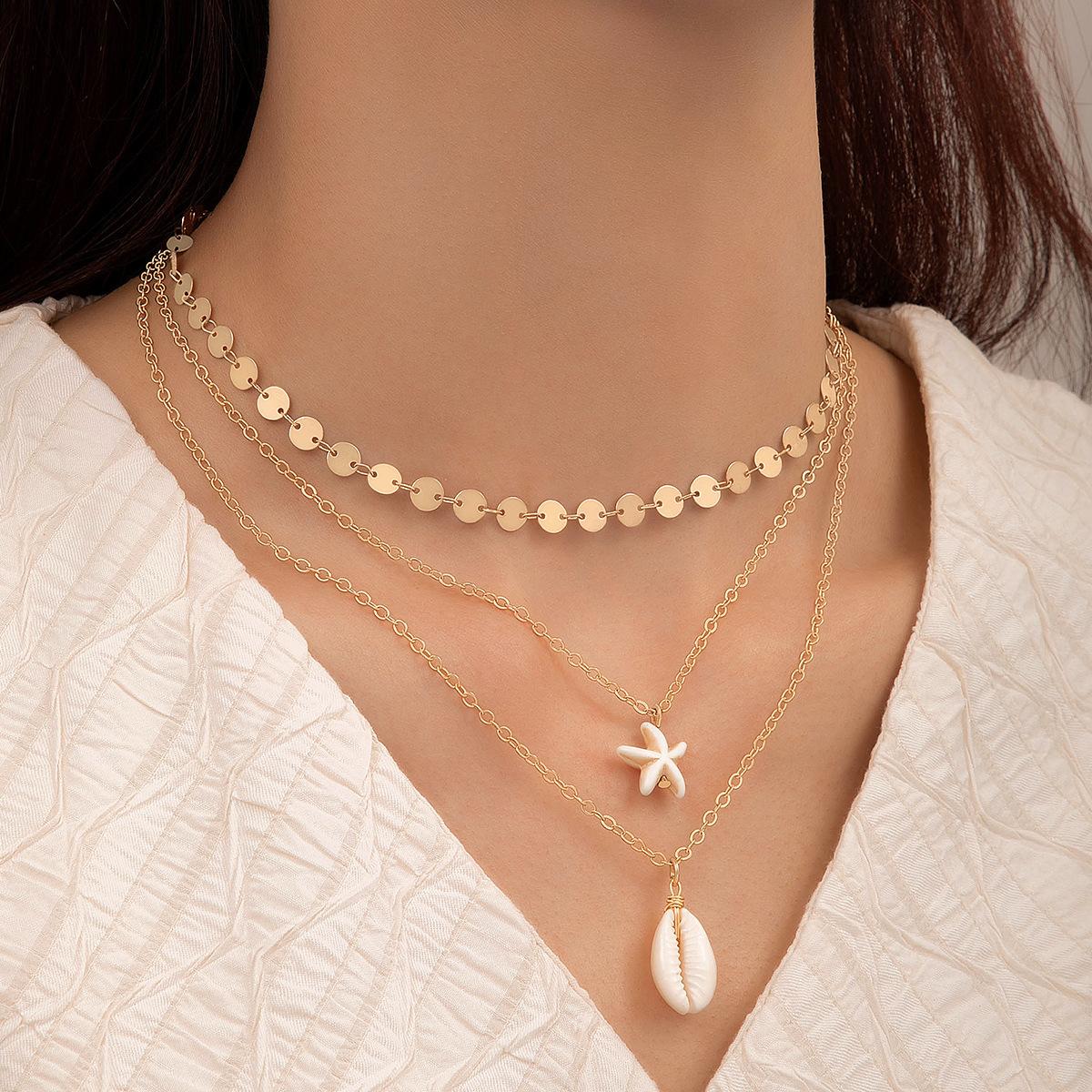 Holiday style fashion jewelry, shell starfish pendant, three-layer necklace, geometric disc multi-layer neck chain.