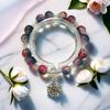 Braccialetto in Vetro Fiore Esplosione Fantasy da 10 mm: Ciondolo Farfalla Colore Degradé Design di Nicchia per Donne e Migliori Amiche.