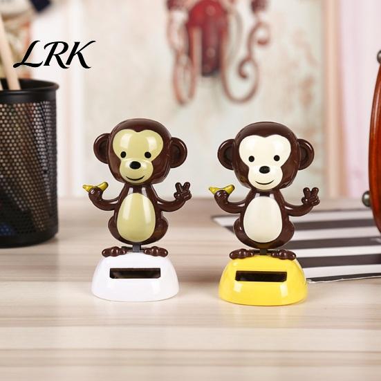 Banana Holding Monkey Figure Solar Car Ornaments, Shaking Head Toy, Interior Decoration Figure, Dashboard Swinging Figurine