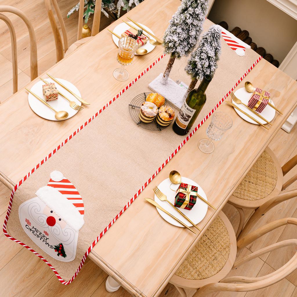 Charming Burlap Christmas Table Decor With Striped Edges Adorned With Whimsical Snowman And Characters Santa