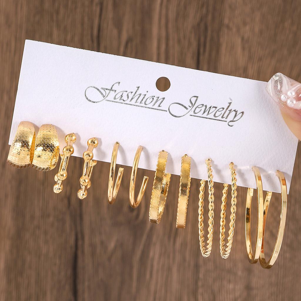 European and American new earrings set 1 pair of golden metal twist pearls creative retro simple and versatile earrings