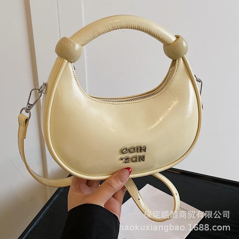 

Super fire niche dumpling bag 2025 new spring and summer versatile shoulder messenger bag exquisite mini portable small bag серебряный