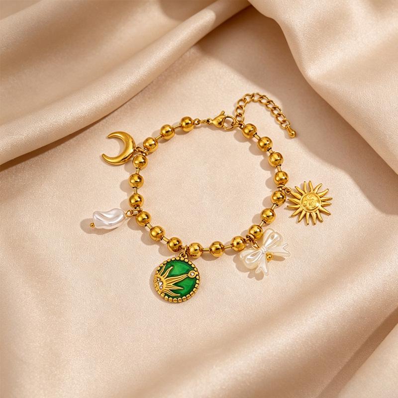 Women's European Retro Multi-Element Titanium Steel Bracelet with 18K Gold Plating and Pearl Accents