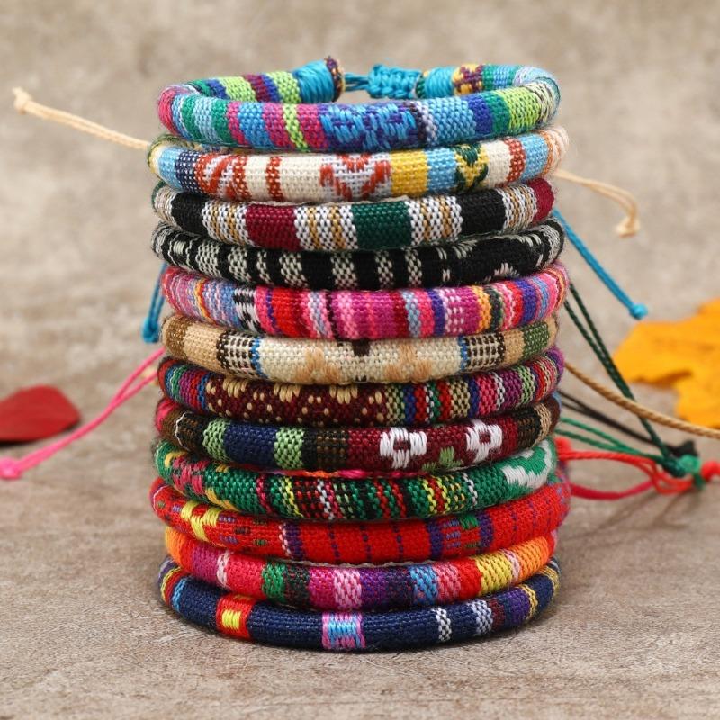 

New TEMU12-piece set of hand-woven cotton and linen fabric bracelets, famous style, color versatile hand rope