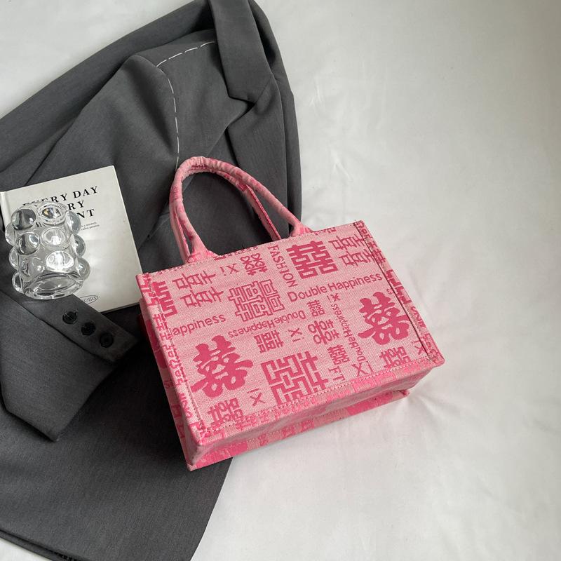 

Wedding bag Female bride Wedding red bag Happy word portable canvas bag Baixi bag Large capacity tote bag Happy bag