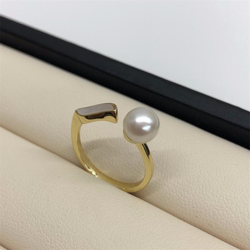 

Регулируемое кольцо из пресноводного жемчуга и белой раковины - Элегантное и модное золотой