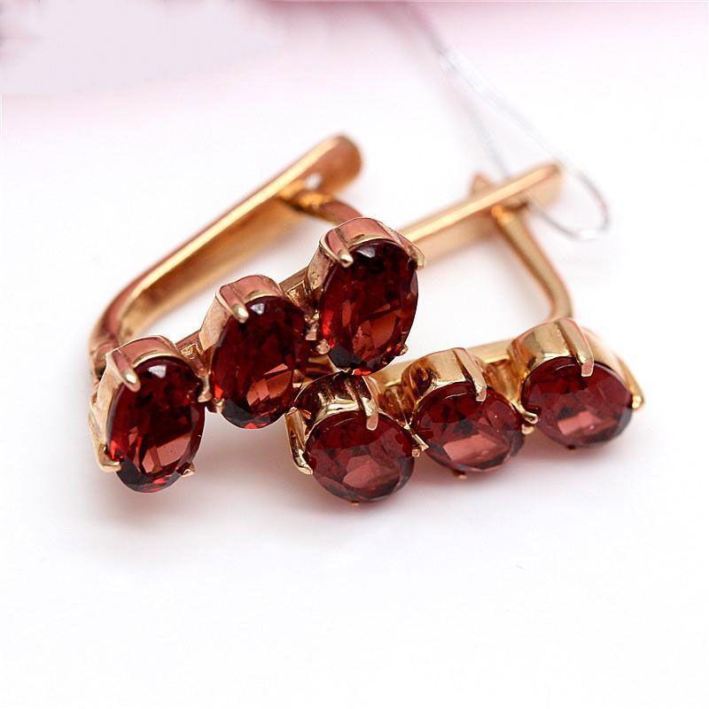 

Exquisite Russian Purple Gold Round Earrings Inlaid With Pomegranate Ear Buckles Trendy Fashion Temperament Rose Gold Plated Earrings