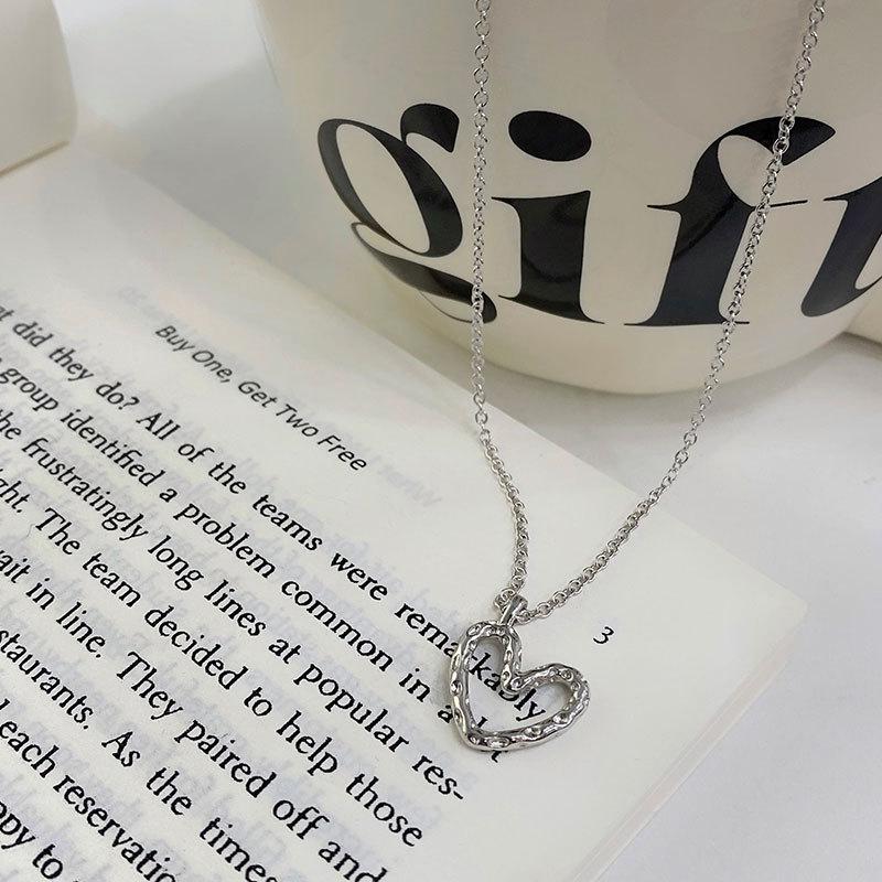 Wrinkled Lava Heart-shaped Necklace with Hollowed Out Heart-shaped Pendant, Collarbone Chain, Niche Design, Temperament