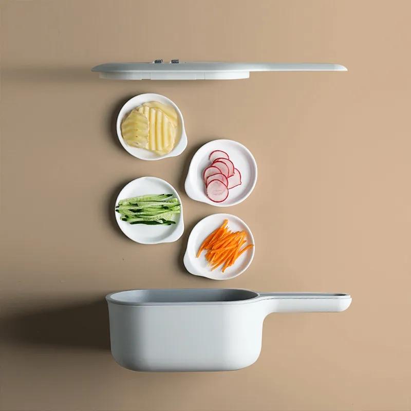 Forniture da cucina Tagliaverdure multifunzione Grattugia per artefatti Patatine fritte Tritatutto domestico Cestello di scarico Macchina affettatrice per pomodori e carote Tritatutto