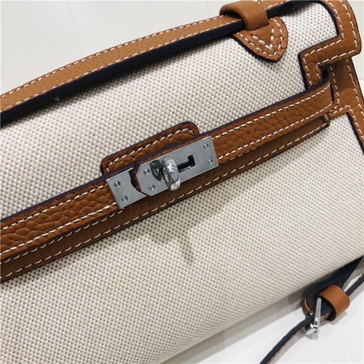 Nowej generacji płócienna torebka kopertówka ze skóry krowiej damska torba na ramię ukośny mała torba torba startowa