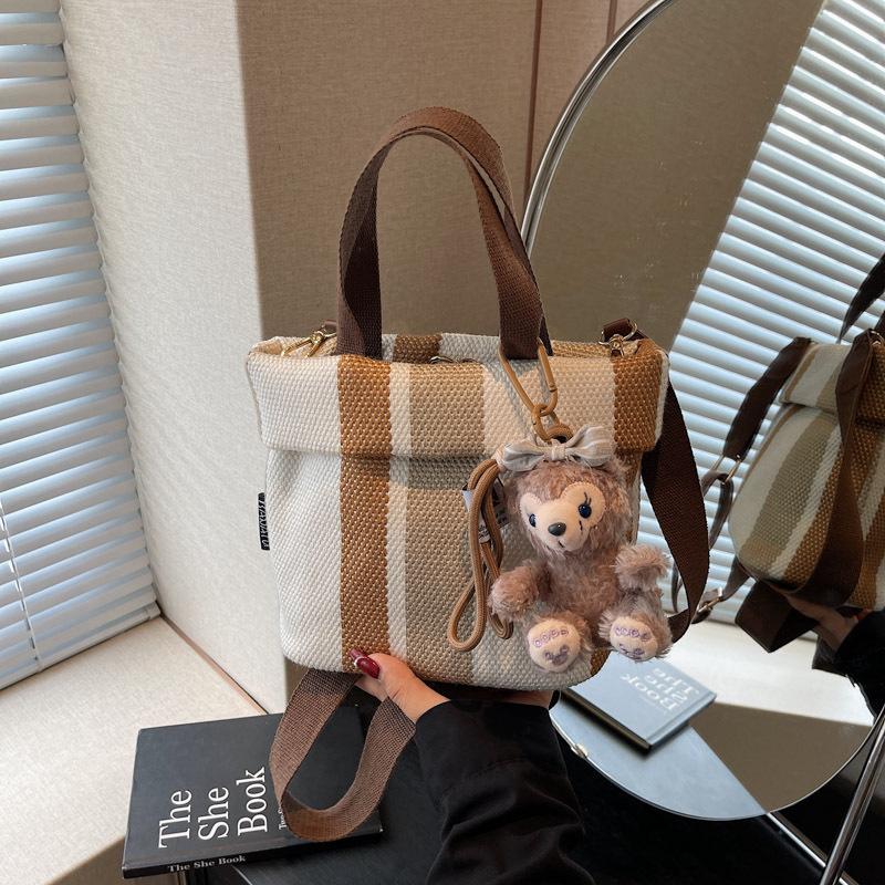 Personality trend casual simple texture bucket bag fashion 2025 summer new foreign style women shoulder messenger bag