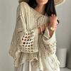 Außenhandel Damenbekleidung beliebt One-Shoulder-Ausschnitt Lochmuster Strickpullover Großhandel Damenpullover Kittel Hersteller Herbst und Winter