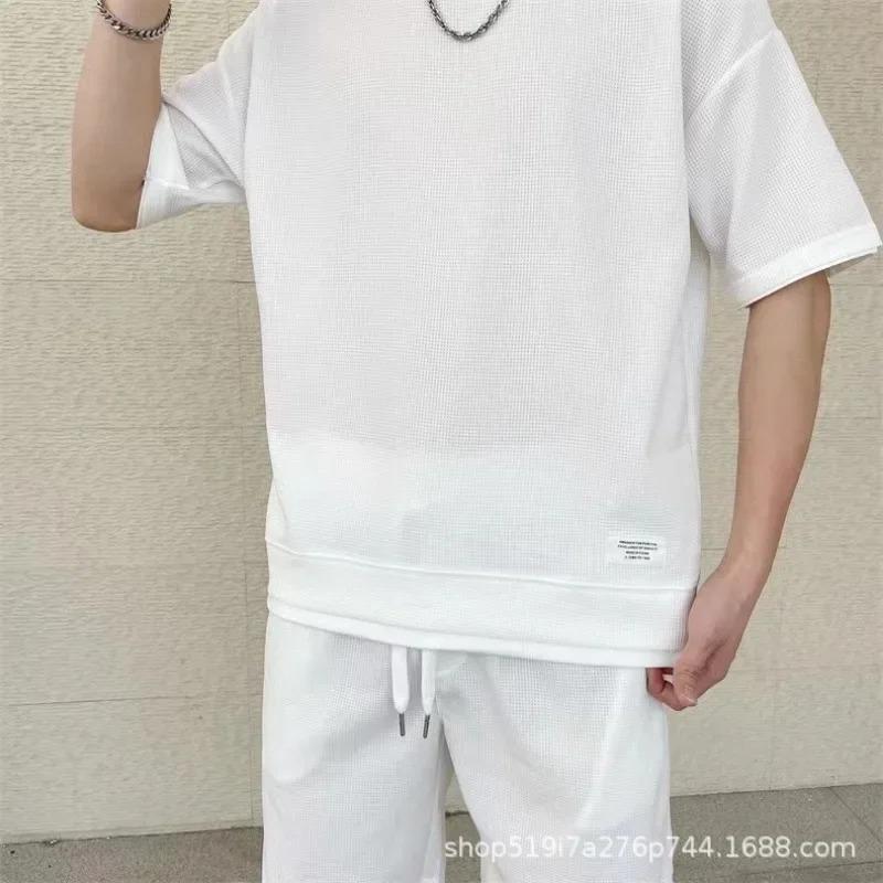New Waffle Suit Men's Summer Explosion Short-sleeved T-shirt Men's Fake Two-piece Five-point Pants Suit Spot Batch Ropa