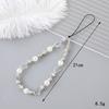 Pearl Bow Mobile Phone Strap Elegant and Durable Accessory