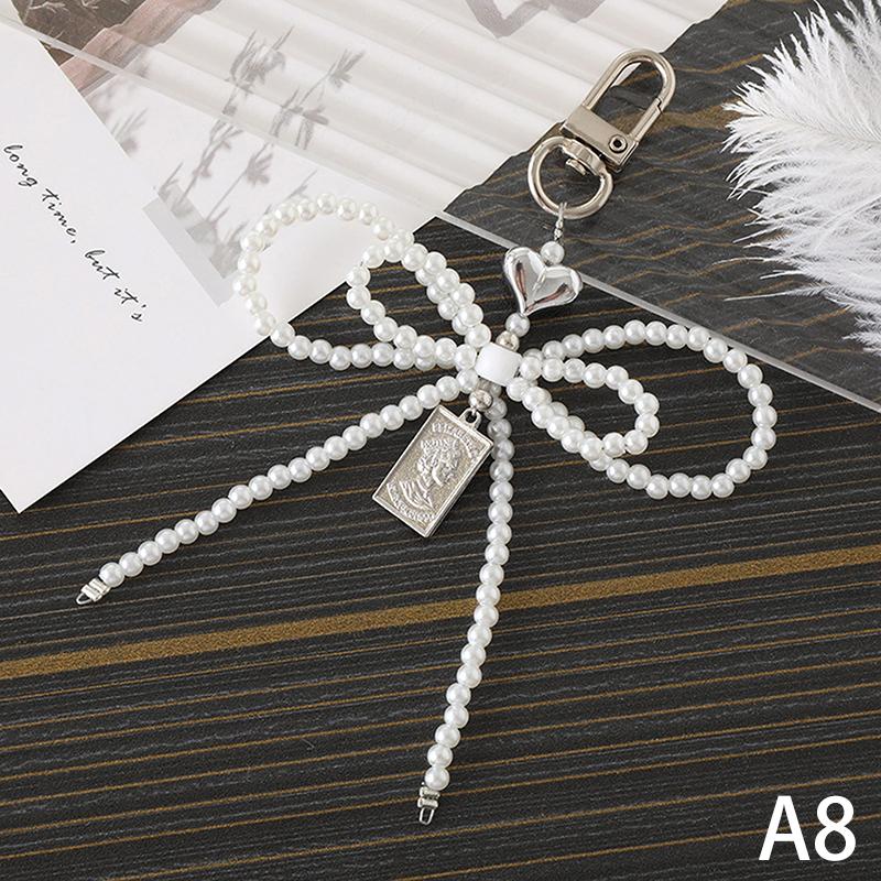 

Нежный бисерный брелок ручной работы в форме банта брелок в форме сердца украшение из жемчуга для сумок и телефонов as the picture