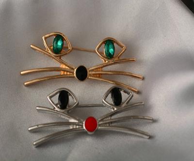 Spilla carina occhio di gatto accessori abbigliamento corsage