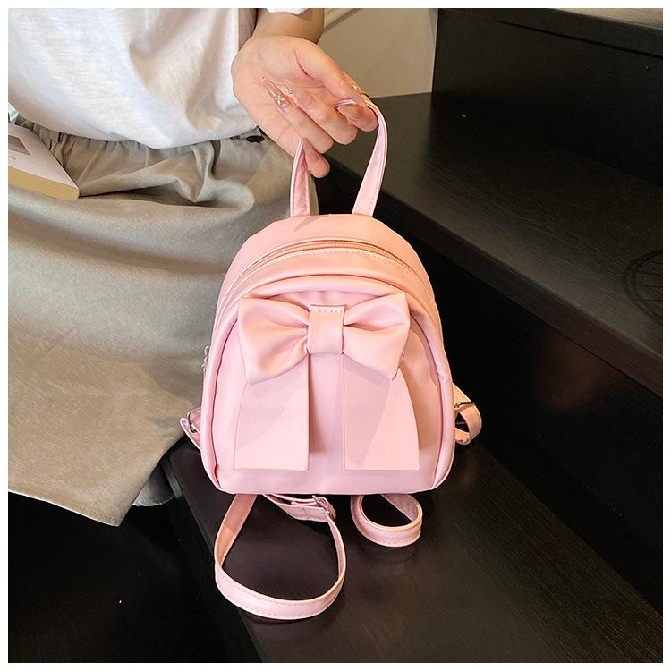 Sac à dos en cuir synthétique style coréen avec nœud papillon pour femme Sac à bandoulière matelassé léger