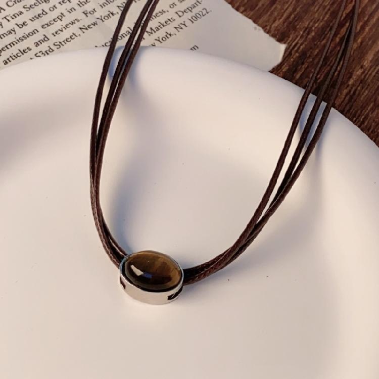 Women Adjustable Leather Necklace Highlighting Tigers Eye Stone Unique Fashion Accessory Suitable for Everyday Wear