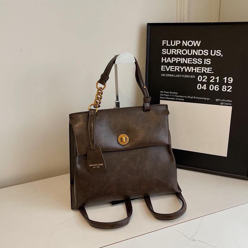 

Ретро рюкзак большой вместимости женский 2025 новый повседневный портативный корейская версия школьный рюкзак высокоценная сумка через плечо рюкзак темно-коричневого