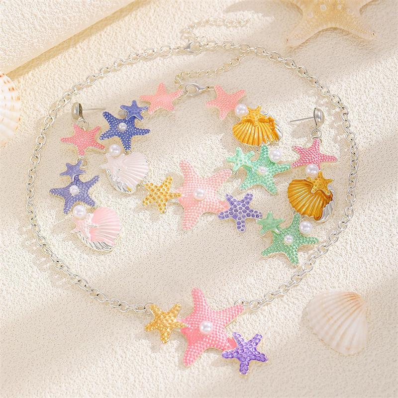 European and American star shell long necklace women's versatile high-end sense inlaid pearl drip oil collarbone chain necklace