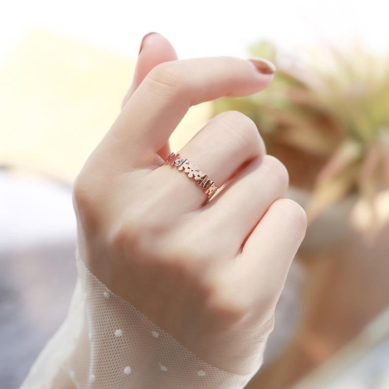 Korean Style Gold-Plated Titanium Steel Hollow Flower Ring for Women