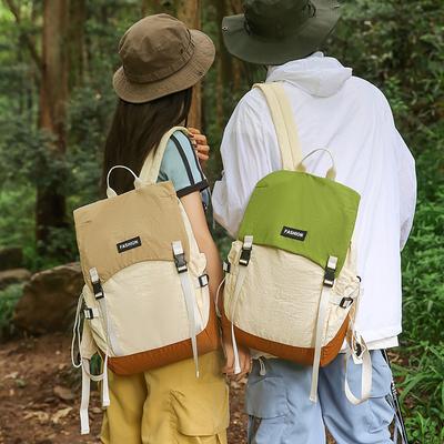 Esquema de cores de montanha ao ar livre para lazer mochila escolar para estudante versão coreana grande capacidade carteiro capa grande etiquetagem mochila
