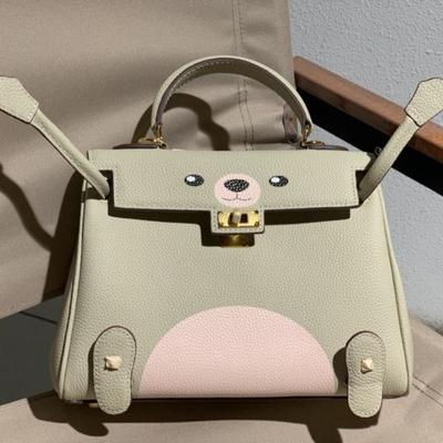 The First Layer of Cowhide TOGO Leather Broken Dimension Cartoon Graffiti Smiley Face Kelly Doll Women's Bag (S08-202528KL)