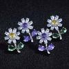The same style as the star, niche design small flower stud earrings, autumn daisy earrings and ears.