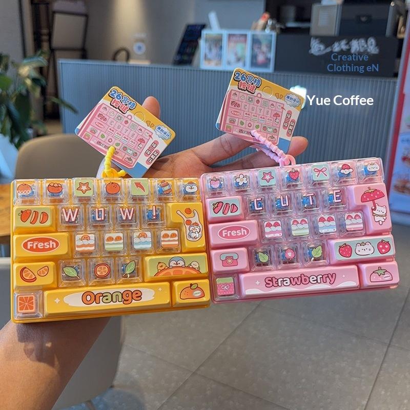 Cute Fruit Themed 26-Key Mini Keyboard Shaped Fidget Toy With Lovely Cartoon Patterns For Kids Gifts Daily Stress Relief
