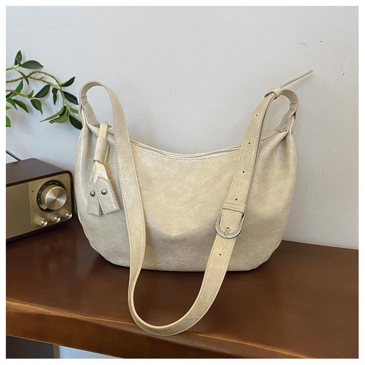 

Текстурированная женская сумка из мягкой кожи большой вместимости, новая модная простая ретро сумка через плечо 2025, сумка-мессенджер для通勤, сумка-пельмень