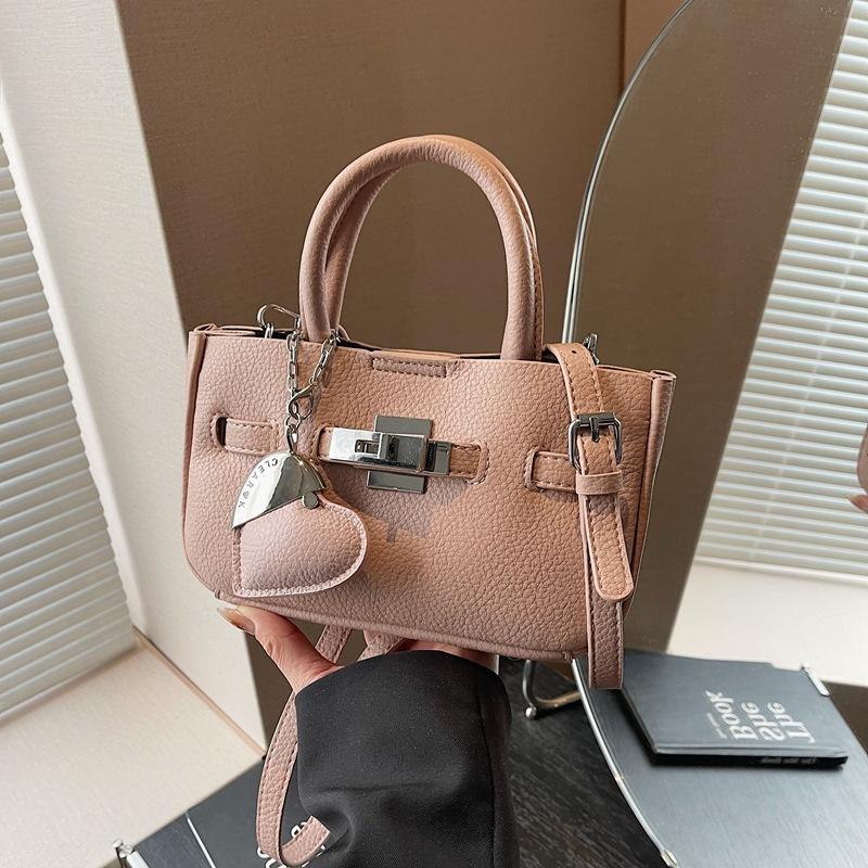 Premium Sense Hand Trage Tasche Damen Neue Mode Einfache Schulter Umhängetasche Nische Pendler Tasche