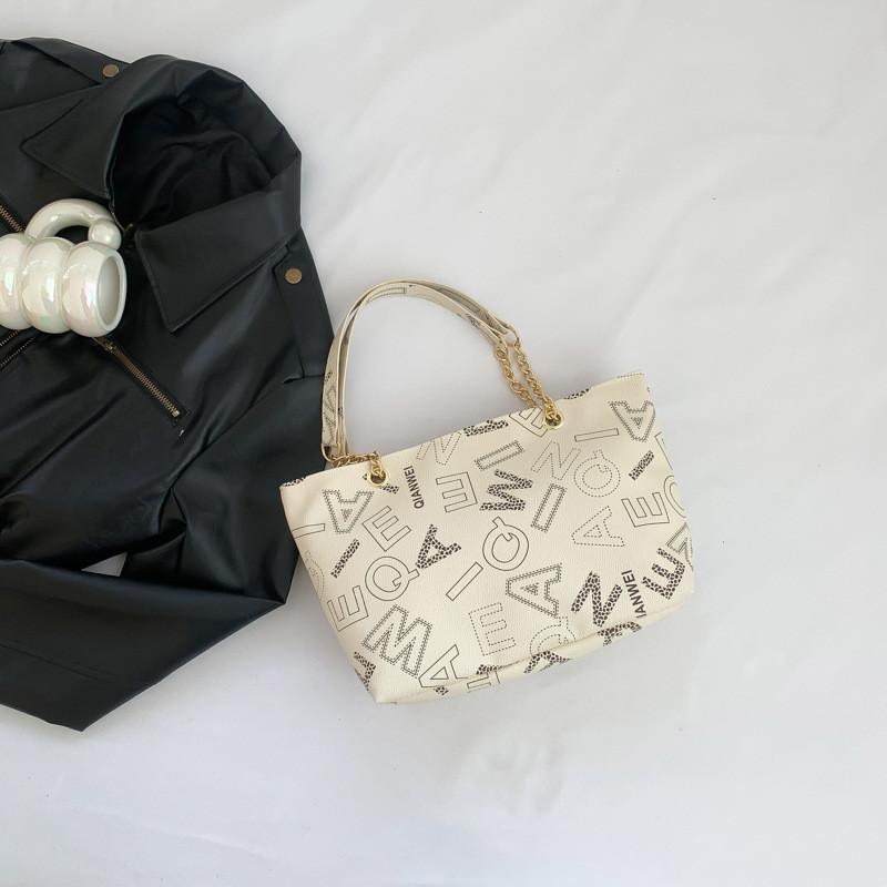 

Stylish Retro Fashion Tote Bag For Women With Spacious Capacity And Chic Design OffWhite
