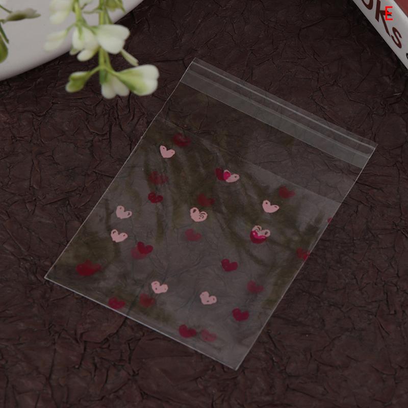 

100 шт. Прозорі пакети у формі серця для цукерок, печива, самоклеючий пакет для зберігання