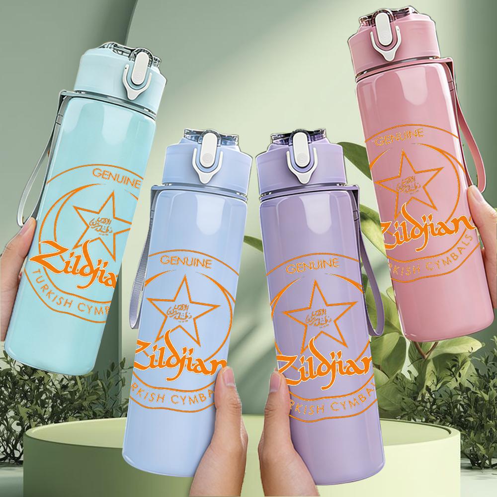 1PC Orange circular star emblem print 750ml colorful plastic sports water bottle leakproof pop lid with straw for outdoor office home use