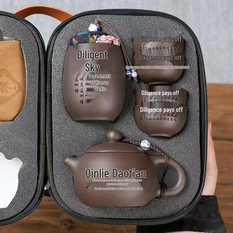 Zisha Travel Tea Set: Portable Xishi Pot with Quick-Brew Cup and Four Cups - Perfect for Outdoor or Home Tea Ceremonies.