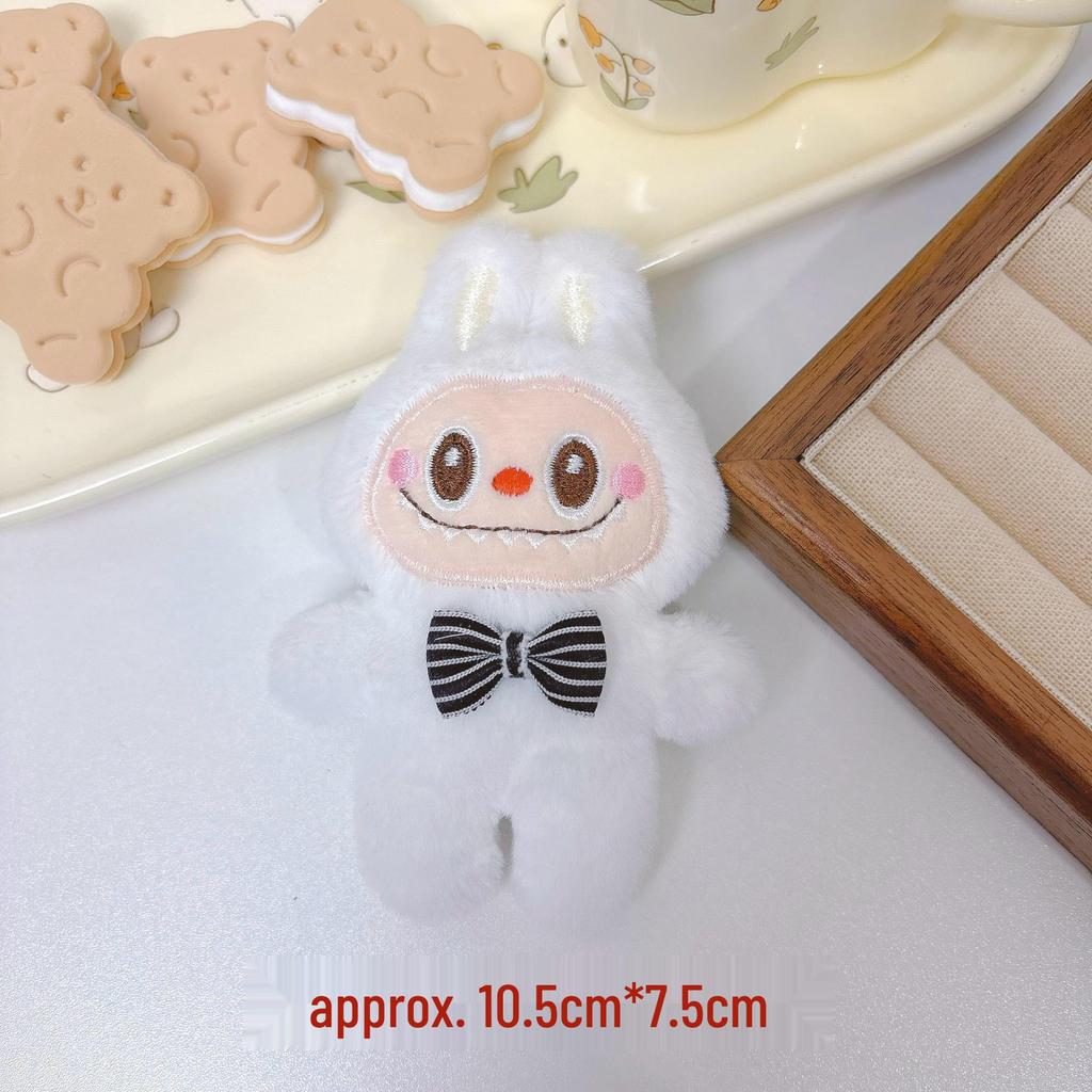 Adorable Labubu Plush Doll Keychain with Bow Accent: Cartoon Character Charm for Bags and Accessories