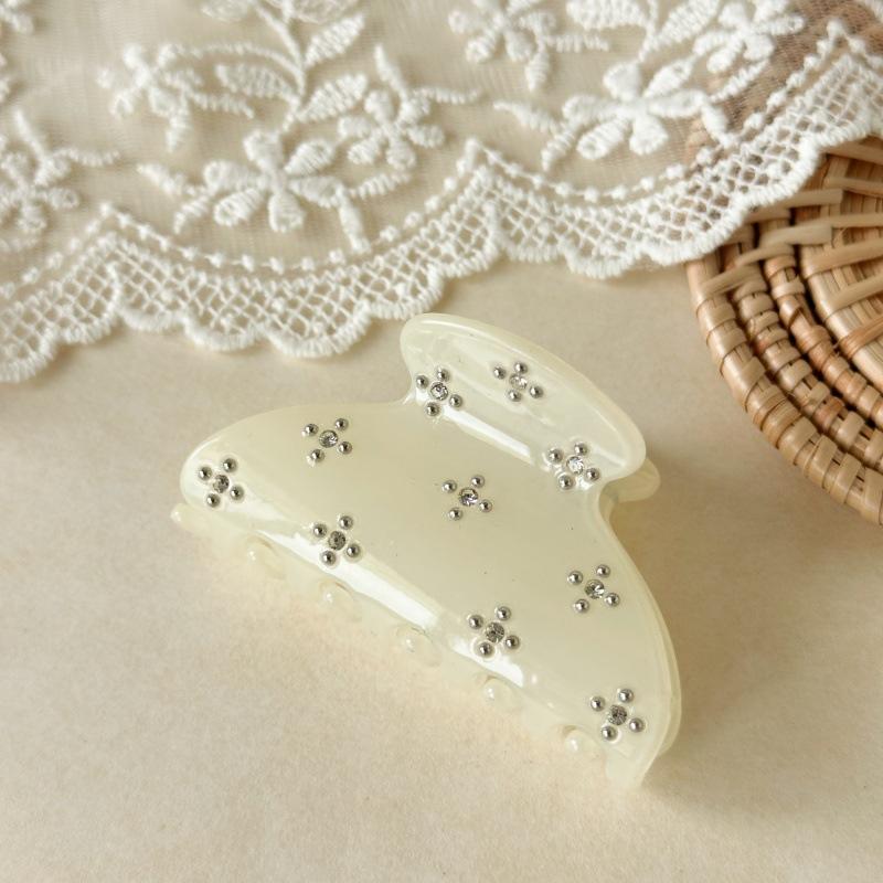 

Sophisticated Deep-Tone Hair Clamp Adorned With Intricate Sparkling Micro-Studs For An Elevated Evening Look And Secure Hold Rhinestone Off-White