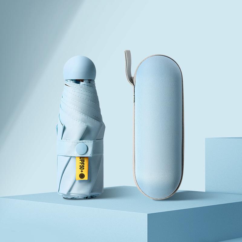 50 % rabatt på svart kapselparaply i lommeformat - Seks-skjerms sammenleggbar for sol og regn