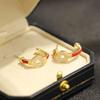 New Chinese festive atmosphere red rope copper coin earrings temperament versatile diamond set 925 silver needle stud earrings women's model