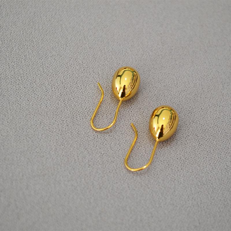 

Korean-Style Gold-Plated Brass Water Drop Earrings - Elegant and Versatile Women s Accessories золотой