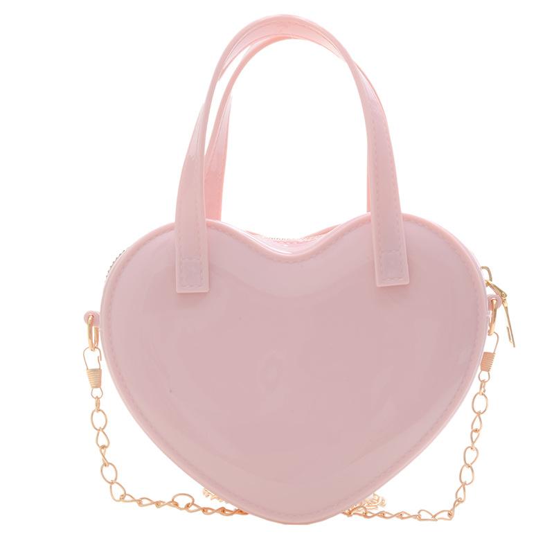 

Bag women s summer new trendy fashion jelly bag Korean version versatile peach heart mini shoulder oblique women s bag рожевий